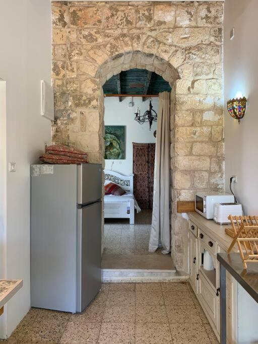 בית האבן העתיק מ-1885 עם מגונית פרטית בחצר Rosh Pinna Esterno foto